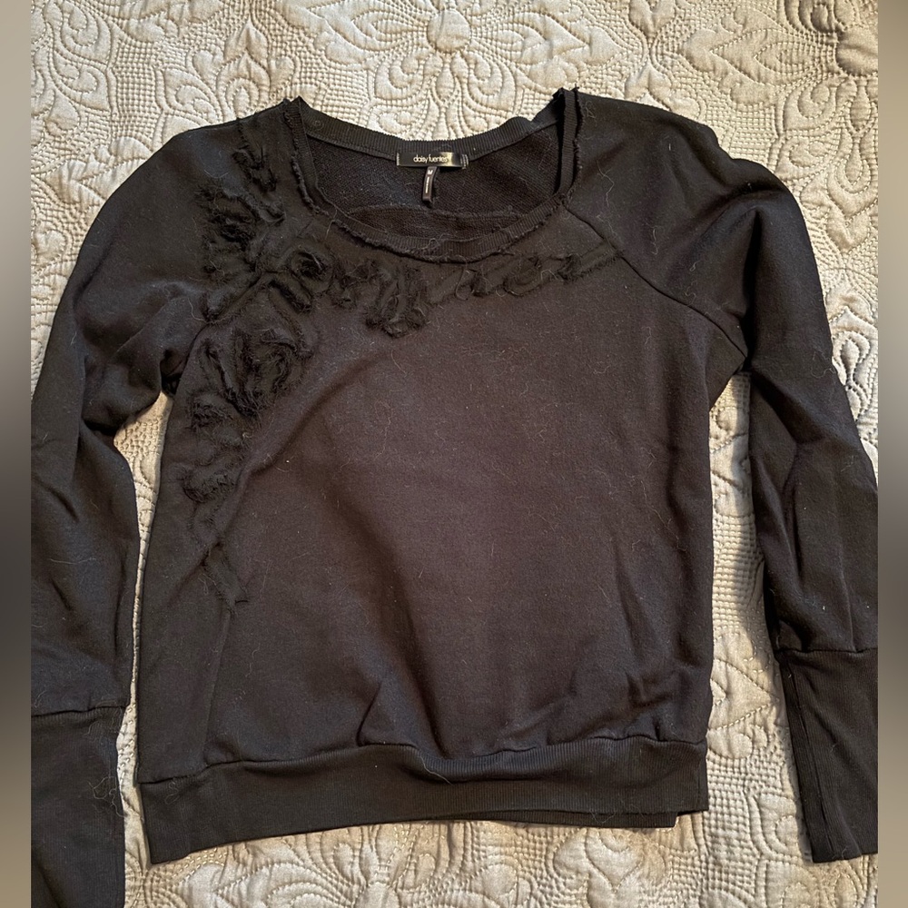 Daisy Fuentes black long sleeve shirt.